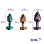 Three diamond-shaped butt plugs with measurements and 'Dr. Tush's' branding on a white background.