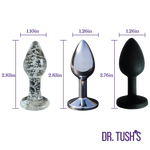 Beginner Anal Plugs with Glass, Metal and Silicone with measurements with 'Dr. Tush' branding on a white background